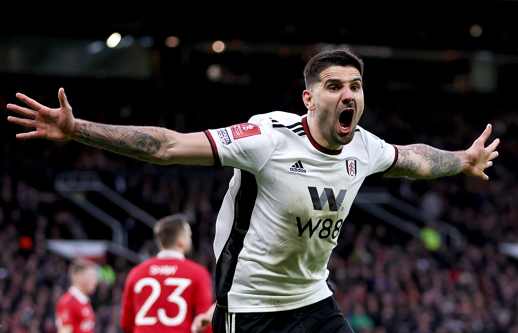 Aleksandar Mitrovic of Fulham celebrates after scoring the team's first goal during their FA Cup clash with Manchester United at Old Trafford in Manchester, England, March 19, 2023. /CFP