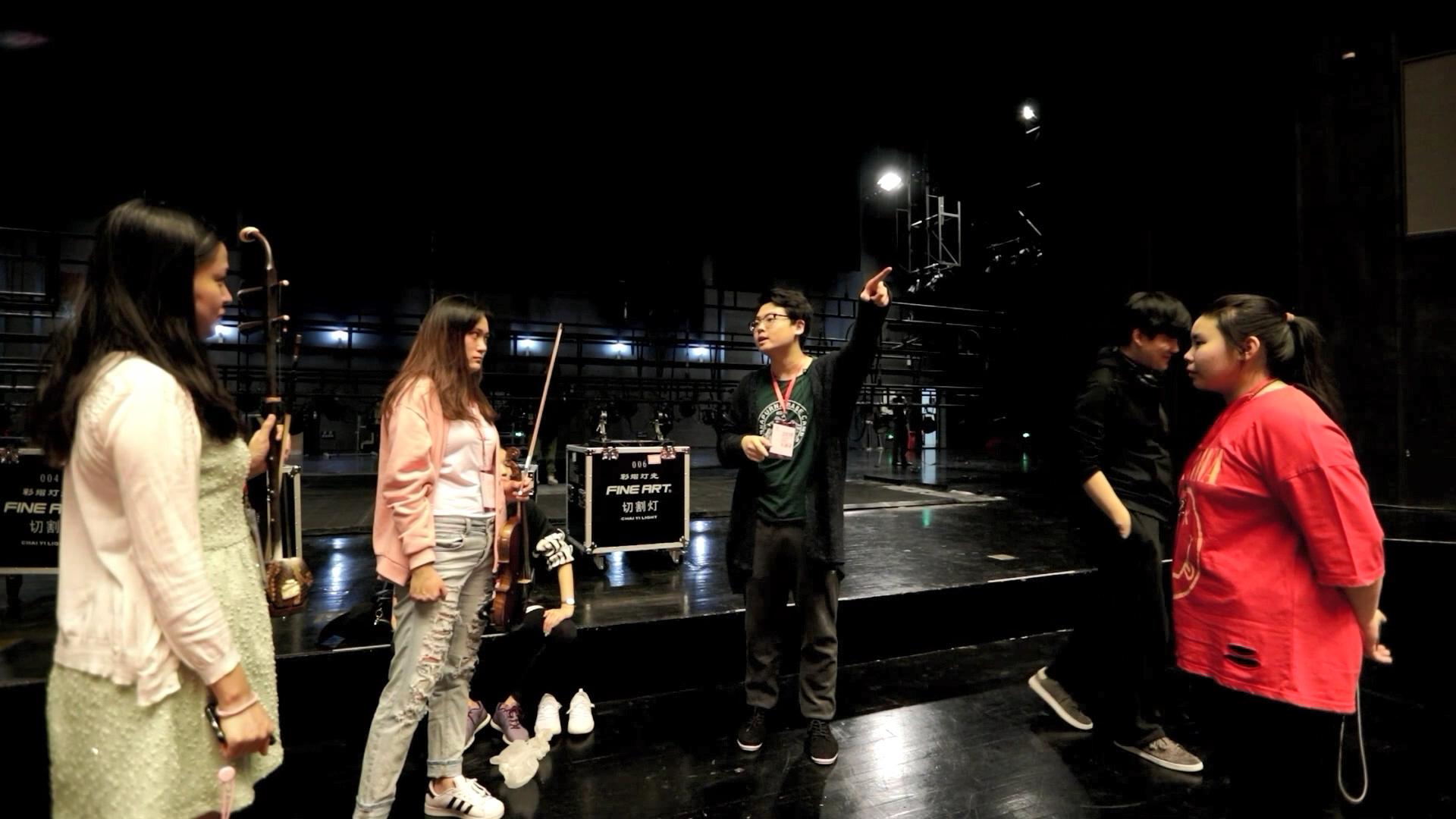 Ding Yiteng works with his team in a theater in Beijing. /Courtesy: Ding Yiteng