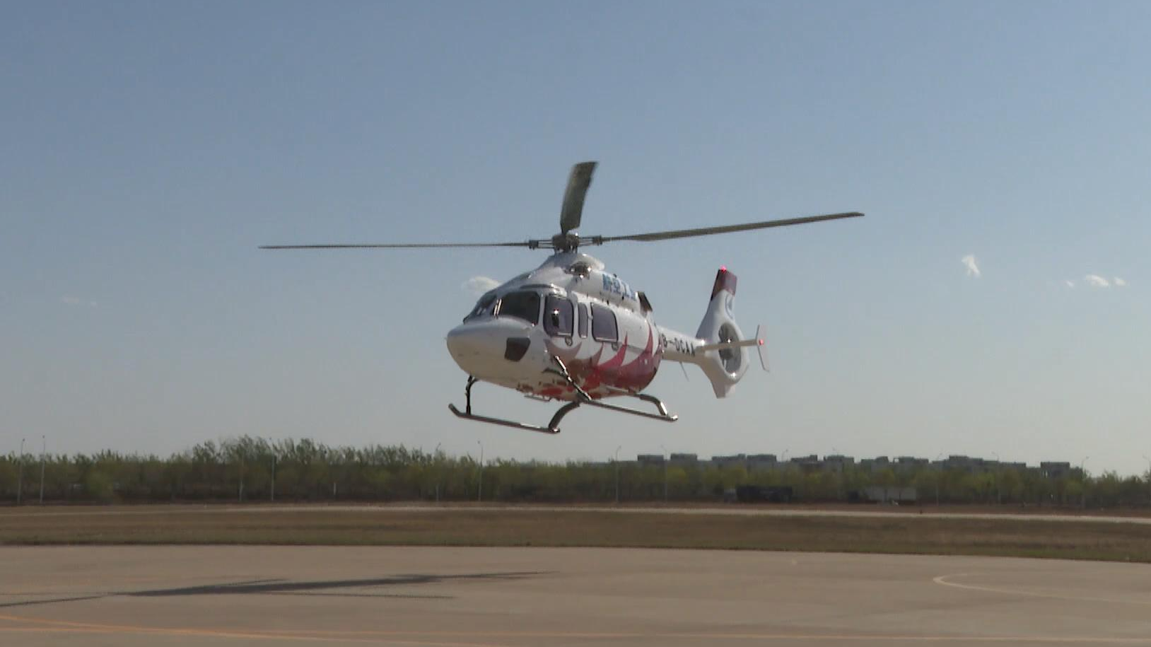 China's AC332 twin-engine civil helicopter successfully conducts its first full-state flight in Tianjin, April 7, 2023. /CMG