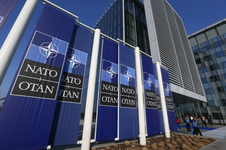 Staff members work at the NATO Headquarters in Brussels, Belgium, March 24, 2022. /Xinhua