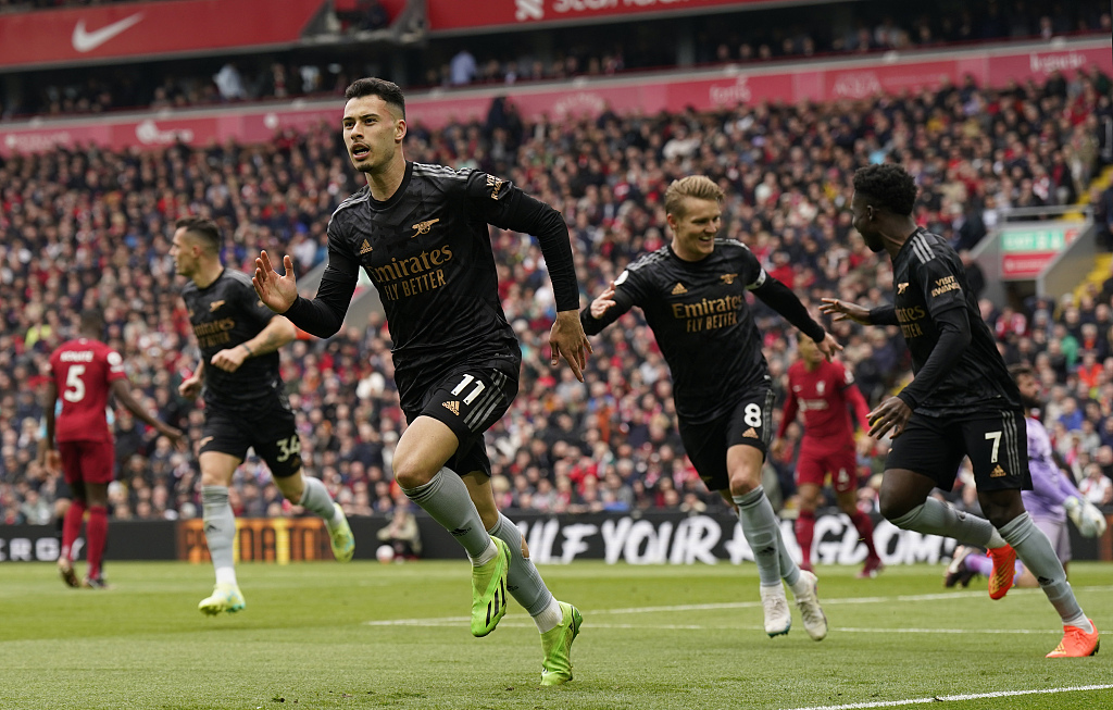 Gabriel Martinelli of Arsenal celebrates scoring the first goal during his team's Premier League match against Liverpool at Anfield in Liverpool, England, April 9, 2023. /CFP