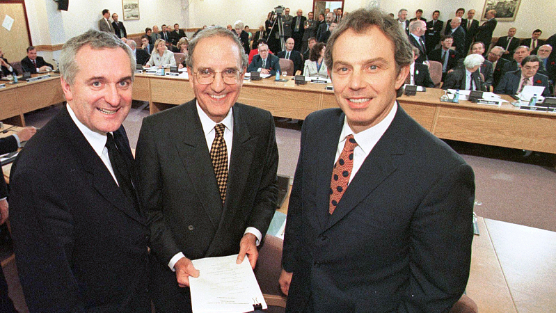 Then British Prime Minister Tony Blair, then U.S. Senator George Mitchell and then Irish Prime Minister Bertie Ahern, pose together after they signed the Good Friday Agreement for peace in Northern Ireland, April 10, 1998. /CFP