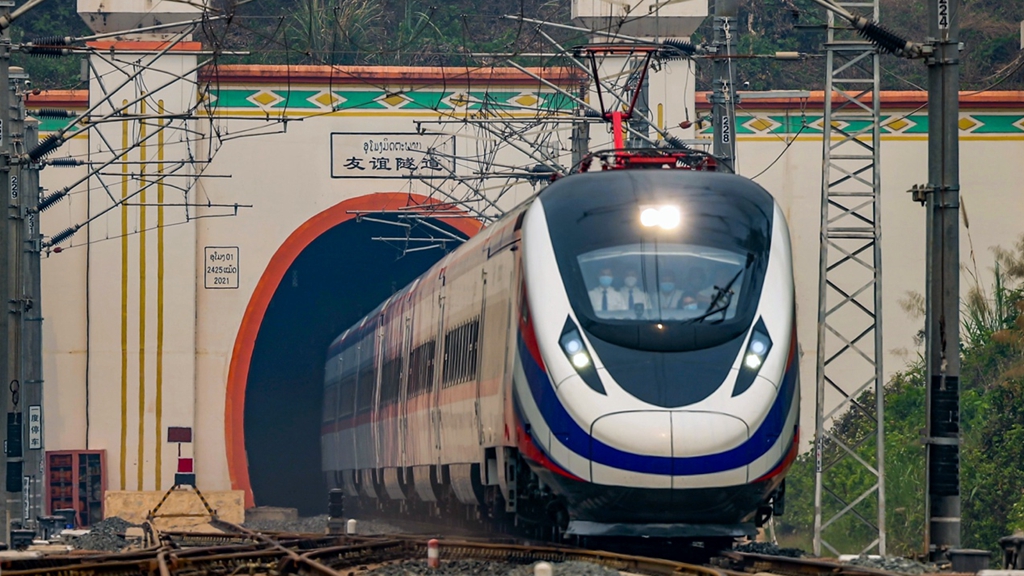 A train setting out from Laos passes the Friendship Tunnel on the China-Laos Railway. /China Railway Kunming Bureau
