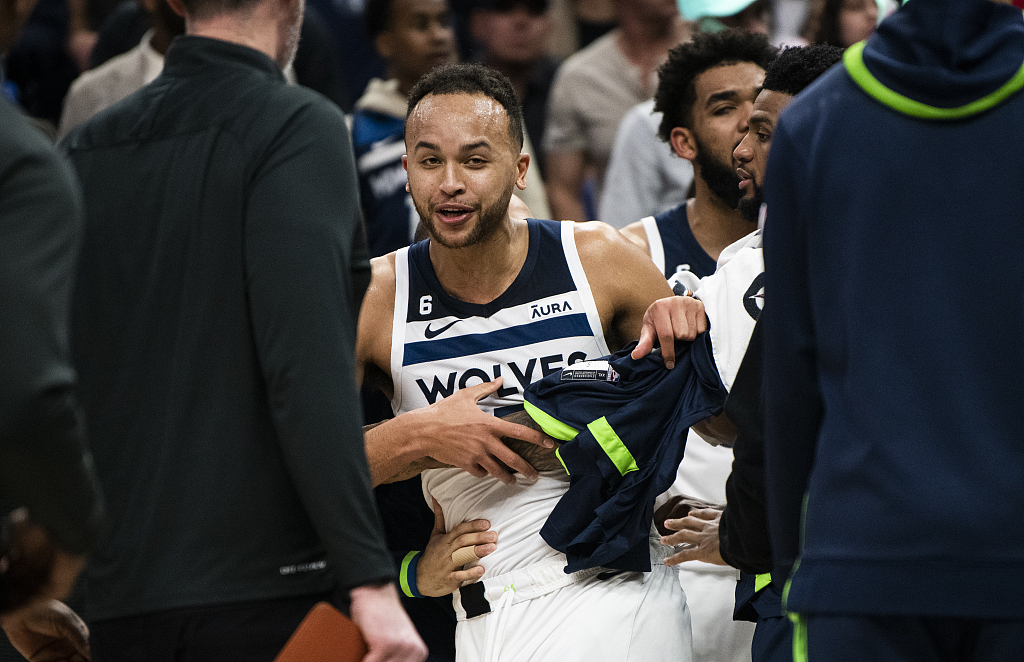 Kyle Anderson of the Minnesota Timberwolves is seperated from his teammate Rudy Gobert in the fight during a timeout in the second quarter of the game against the New Orleans Pelicans at the Target Center in Minneapolis, Minnesota, April 9, 2023. /CFP
