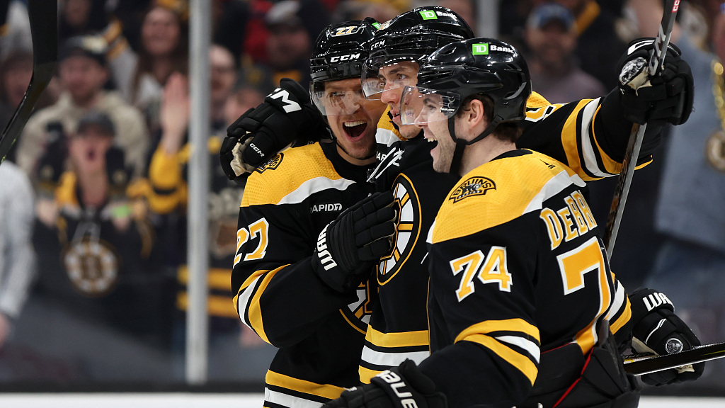 Pastrnak hits 50-goal mark as Bruins top Canes in shootout - The
