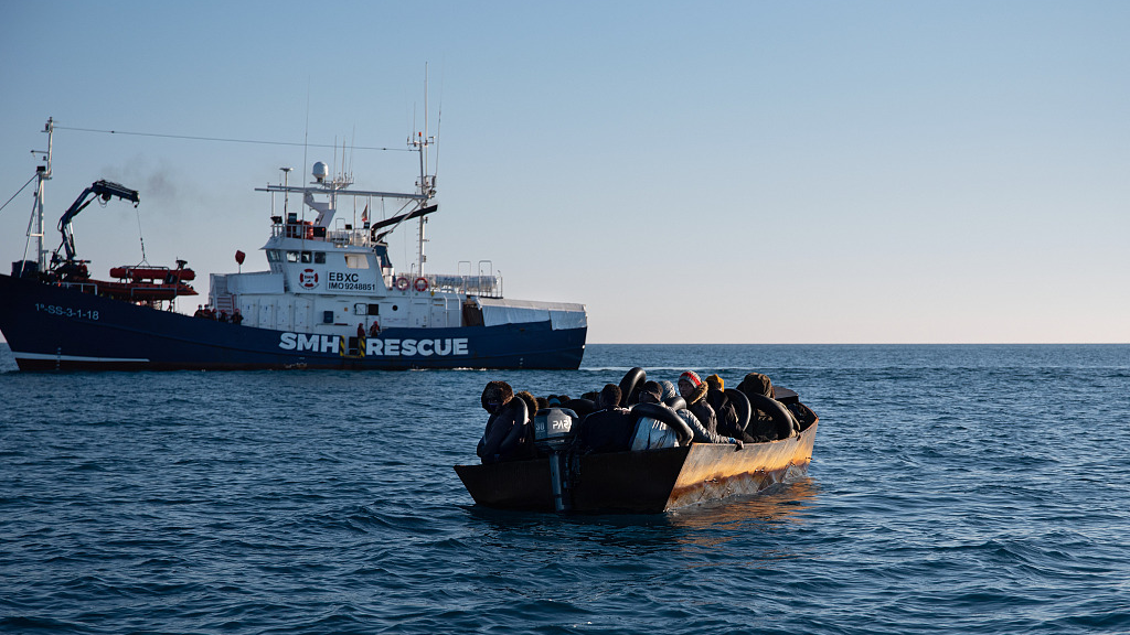 A rescue vessel approaches a metal boat carrying 40 sub-Saharan migrants in Mediterranean Sea, February 21, 2023. /CFP