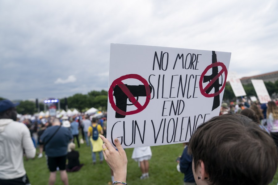 People gather during a rally decrying rising gun violence in Washington, D.C., U.S., June 11, 2022. /Xinhua