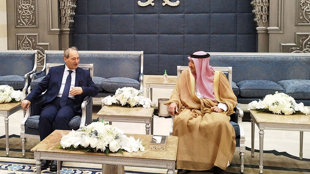 A handout picture released by the official Syrian Arab News Agency (SANA) on April 12, 2022, shows Syrian Foreign Minister Faisal Mekdad (L) meeting with Saudi Deputy Foreign Minister Walid al-Khuraiji in Jeddah, Saudi Arabia. /CFP
