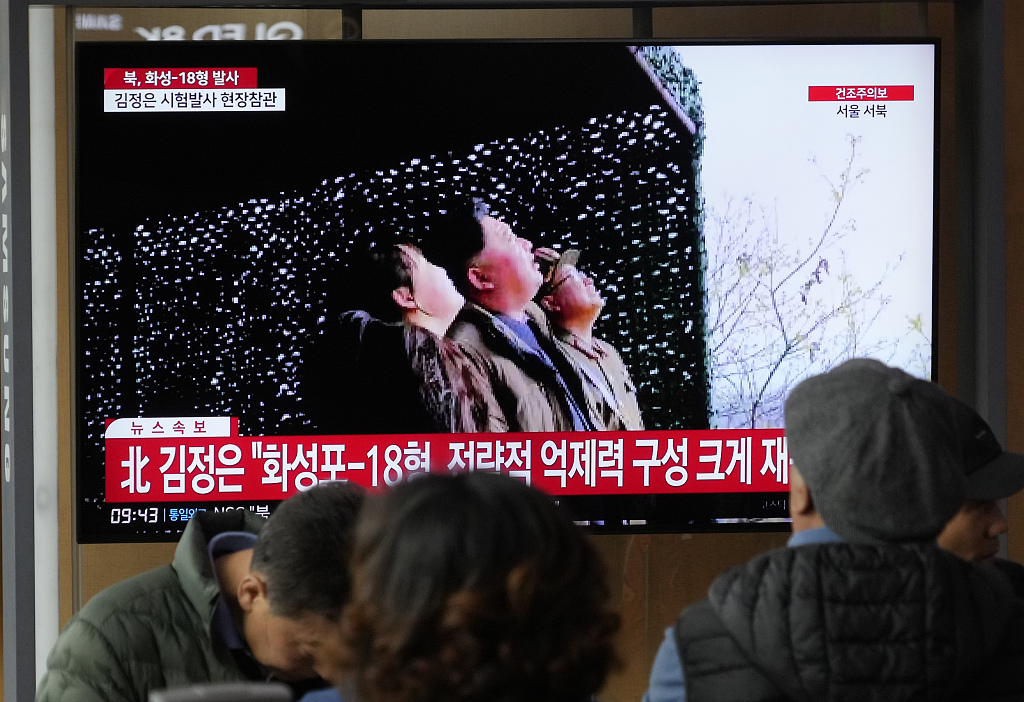 A TV screen shows an image of DPRK leader Kim Jong Un (center) during a news program at the Seoul Railway Station in Seoul, Republic of Korea (ROK), April 14, 2023. /CFP