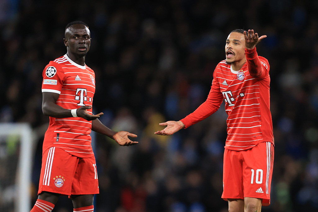 Sadio Mane (L) and Leroy Sane of Bayern Munich argue with each other in the first-leg game of the UEFA Champions League quarterfinals against Manchester City at the Etihad Stadium in Manchester, England, April 12, 2023. /CFP