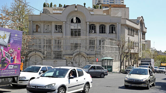 Vehicles drive past the Saudi Arabia embassy in Tehran, Iran, April 5, 2023. /Atta Kenare/AFP