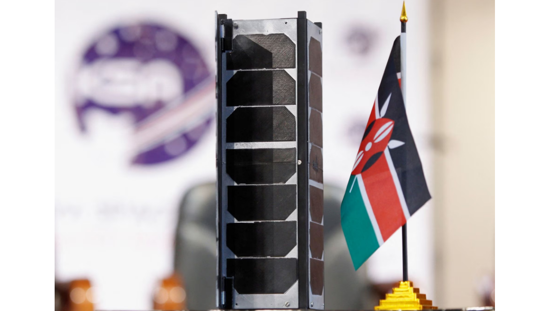 A model of a prototype of a 3U Earth observation satellite, the Taifa-1, is displayed ahead of the launch of Kenya's first operational satellite, at the University of Nairobi's Taifa Hall in Nairobi, Kenya April 14, 2023. /Reuters
