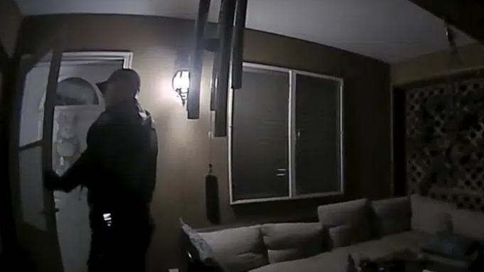 In this image taken from body camera video provided by the Farmington Police Department, a police officer knocks on the door of the wrong address in response to a domestic violence call, in Farmington, New Mexico, U.S., April 5, 2023. /AP
