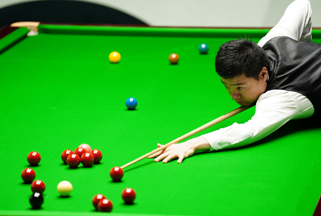 Ding Junhui in action during his match with Hossein Vafaei at the Crucible Theatre in Sheffield, UK, April 17, 2023. /CFP
