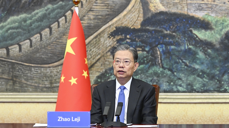 Zhao Leji, chairman of the Standing Committee of the NPC, holds talks with Sebastian Andujar, president of the Uruguayan House of Representatives, via video link in Beijing, China, April 19, 2023. /Xinhua