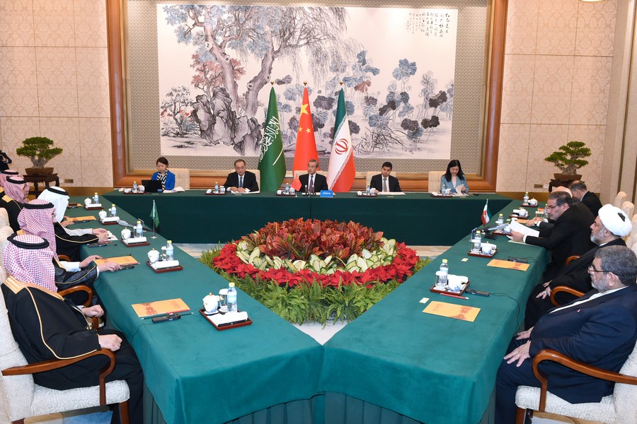 Wang Yi, a member of the Political Bureau of the CPC Central Committee and director of the Office of the Foreign Affairs Commission of the CPC Central Committee, presides over the closing meeting of the talks between a Saudi delegation and an Iranian delegation in Beijing, China, March 10, 2023. /Xinhua