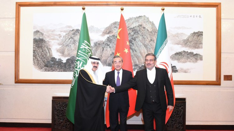 Wang Yi (C), China's top diplomat, attends a closing meeting of the talks between the Saudi delegation led by Musaad bin Mohammed Al-Aiban (L), Saudi Arabia's Minister of State, and Iranian delegation led by Admiral Ali Shamkhani (R), Secretary of the Supreme National Security Council of Iran, in Beijing, China, March 10, 2023. /Xinhua