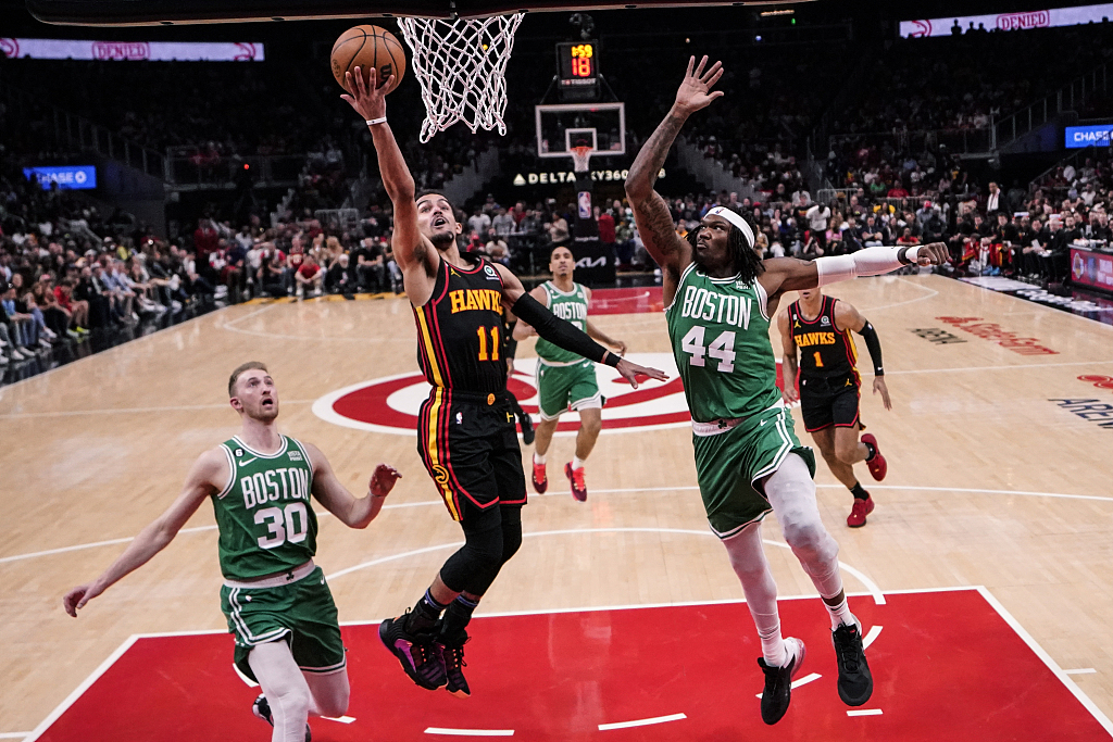 Trae Young (#11) of the Atlanta Hawks drives toward the rim in game 3 of the NBA Eastern Conference first-round playoffs against the Boston Celtics at State Farm Arena in Atlanta, Georgia, April 21, 2023. /CFP
