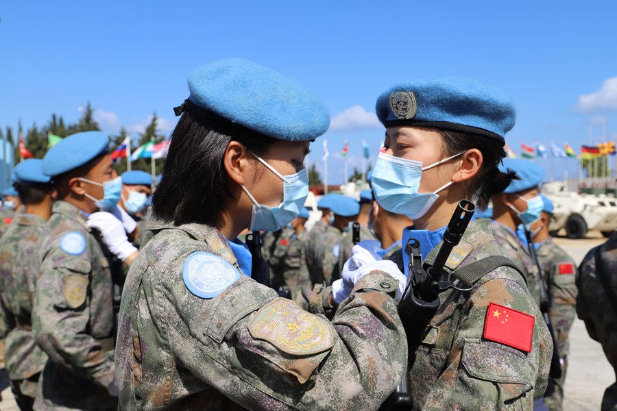 Soldiers from the Chinese contingent to the United Nations Interim Force in Lebanon (UNIFIL) are awarded the United Nations Peacekeeping Medal during a medal parade ceremony in southern Lebanon, June 16, 2021. /Xinhua
