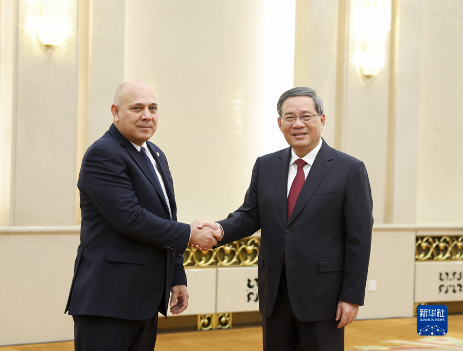 Chinese Premier Li Qiang (R) meets Roberto Morales Ojeda, member of the Political Bureau and secretary of organization of the Communist Party of Cuba Central Committee in Beijing, China, April 24, 2023. /Xinhua