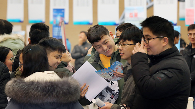 A college graduates exchange meeting is held in a college of Nantong City, east China's Jiangsu Province, January 12, 2020. /CFP