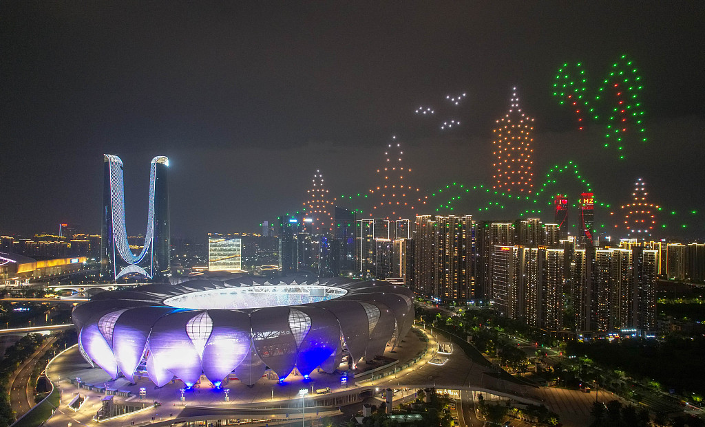 Air drones display different elements of the Hangzhou Asian Games over the main venue of the event in Hangzhou, Zhejiang Province, China, April 25, 2023. /CFP