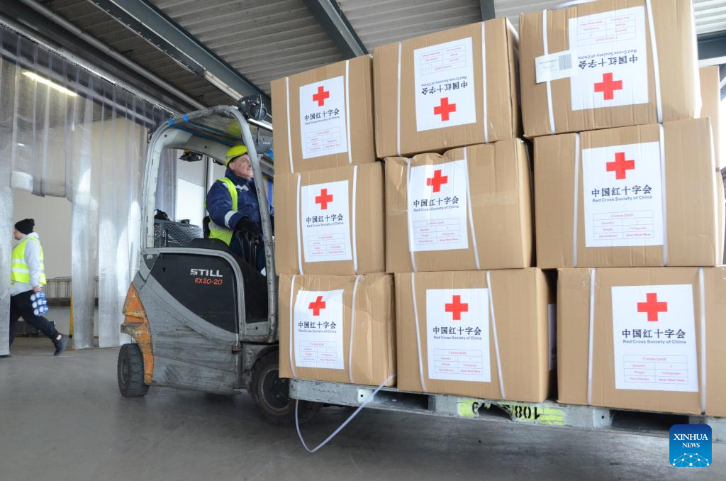 Humanitarian aid supplies sent by the Red Cross Society of China to the Ukrainian Red Cross Society are transported in Warsaw, Poland, March 15, 2022. /Xinhua