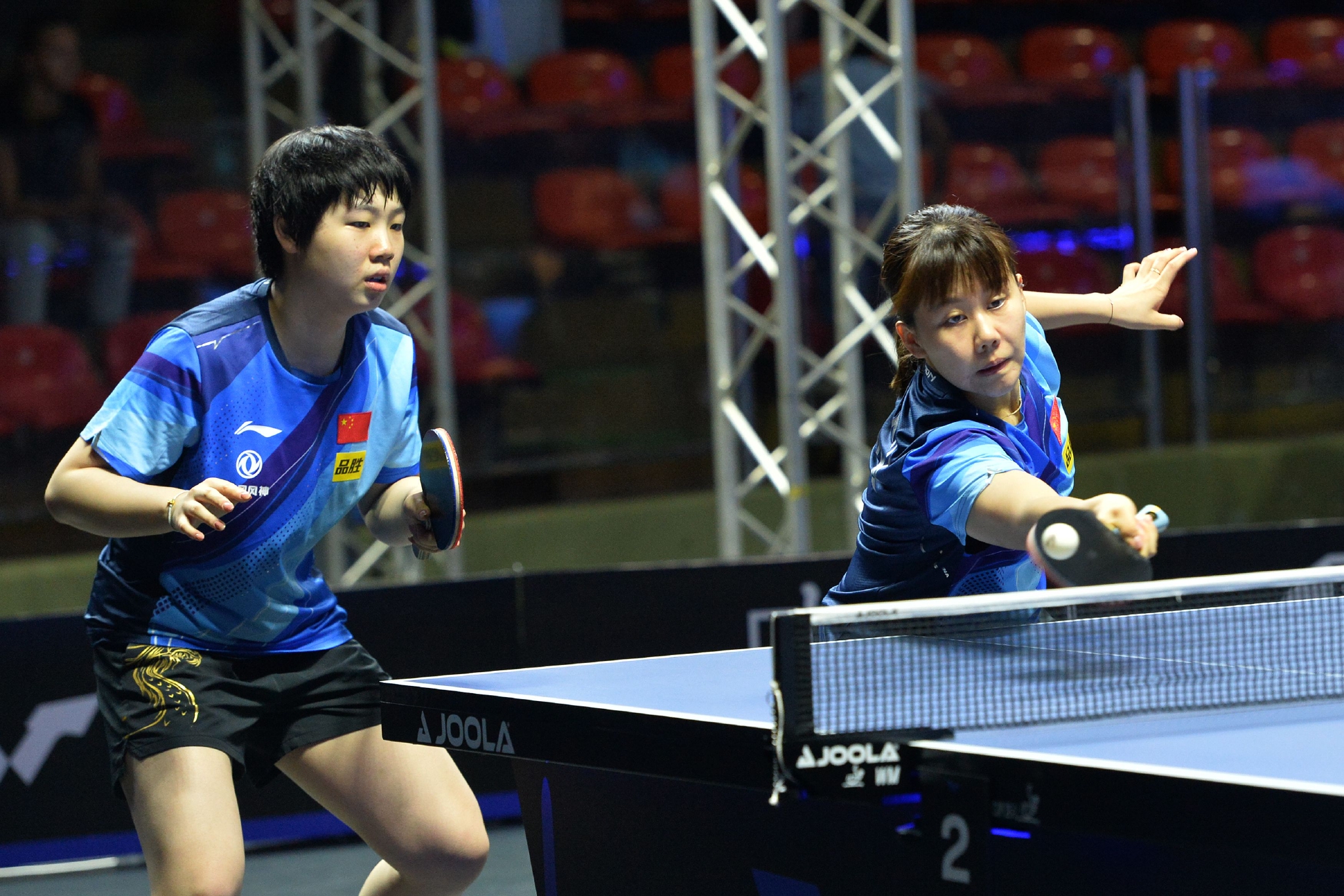 Chen Xingtong (R) and Kuai Man of China compete in the women's doubles quarterfinals at the World Table Tennis Championships Star Contender Bangkok 2023, Thailand, April 26, 2023. /Xinhua