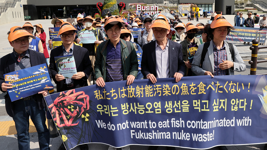 A protest to condemn Japan's plan to release waste water from the Fukushima nuclear disaster into the sea at Busan Station Square in Seoul, South Korea, April 20, 2023. /CFP