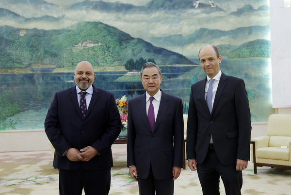 Wang Yi (C), a member of the Political Bureau of the CPC Central Committee and director of the Office of the Foreign Affairs Commission of the CPC Central Committee, meets with co-chairs of the Intergovernmental Negotiations on Security Council Reform of the 77th Session of the UN General Assembly, Tareq Albanai and Alexander Marschik, in Beijing, China, April 29, 2023. /Chinese Foreign Ministry