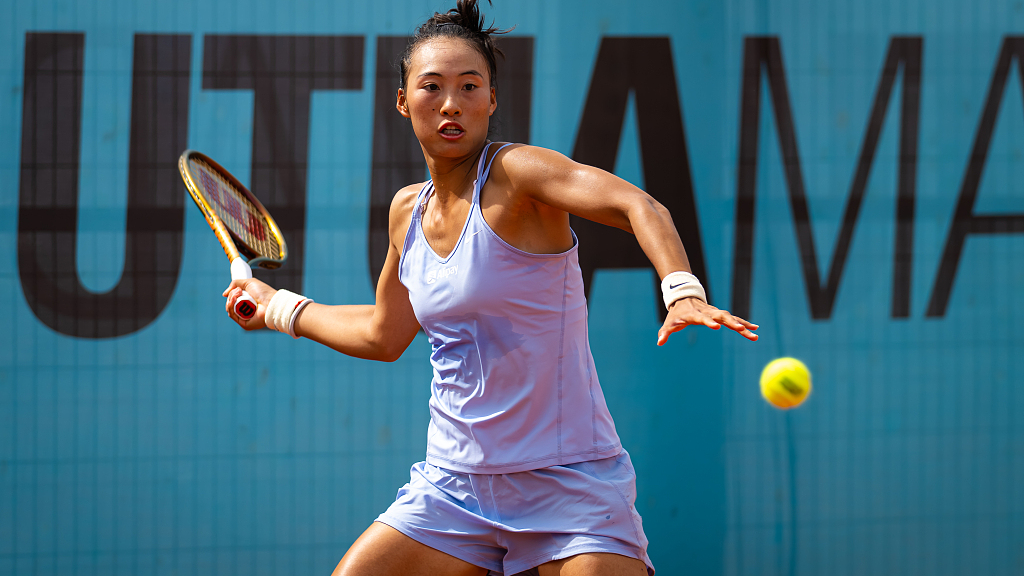 Zheng Qinwen in action during the Madrid Open women's singles second round in Madrid, Spain, April 28, 2023. /CFP