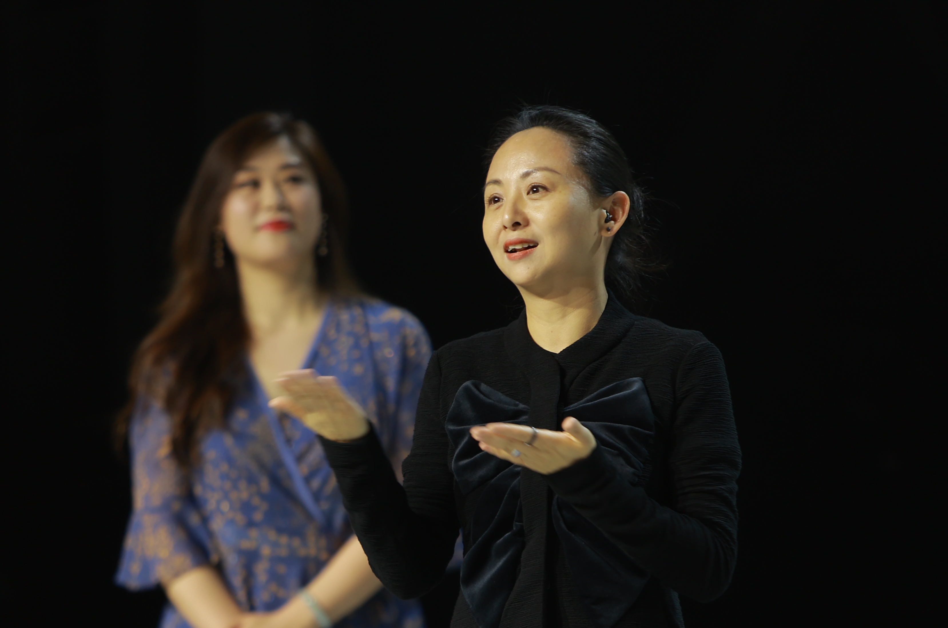 Tai Lihua, dancer and president of the China Disabled People's Performing Art Troupe, presents her new work Dream to guests. /CGTN