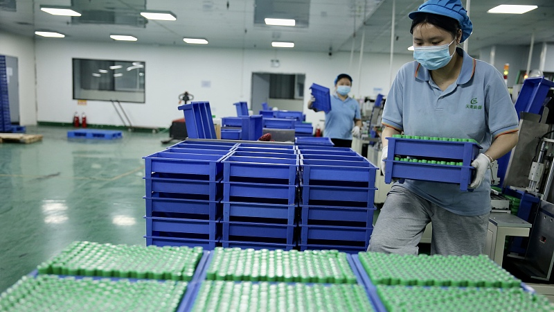 Workers are producing lithium-ion batteries in a factory, Suining City, southwest China's Sichuan Province, April 14, 2022. /CFP