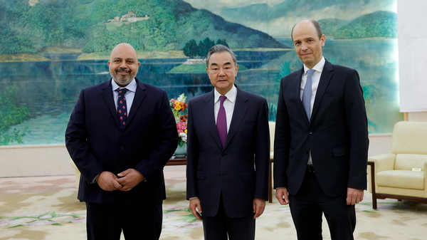 Wang Yi (C), a member of the Political Bureau of the CPC Central Committee and director of the Office of the Foreign Affairs Commission of the CPC Central Committee, meets with co-chairs of the Intergovernmental Negotiations on Security Council Reform of the 77th Session of the UN General Assembly, Tareq Albanai and Alexander Marschik, in Beijing, China, April 29, 2023. /Chinese Foreign Ministry