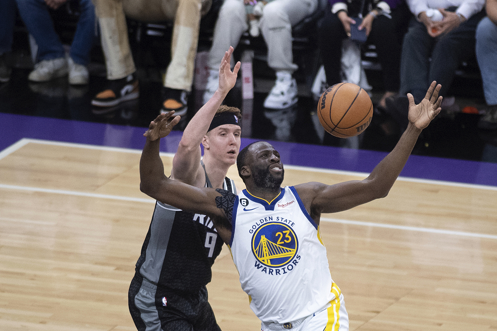 Draymond Green (#23) of the Golden State Warriors competes for the ball in Game 7 of the NBA Western Conference first-round playoffs against the Sacramento Kings at the Golden 1 Center in Sacramento, California, on April 30, 2023. /CFP