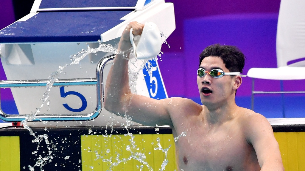 Pan Zhanle reacts after winning the gold in the men's 100m freestyle at the National Championships in Hangzhou, China, May 1, 2023. /CFP