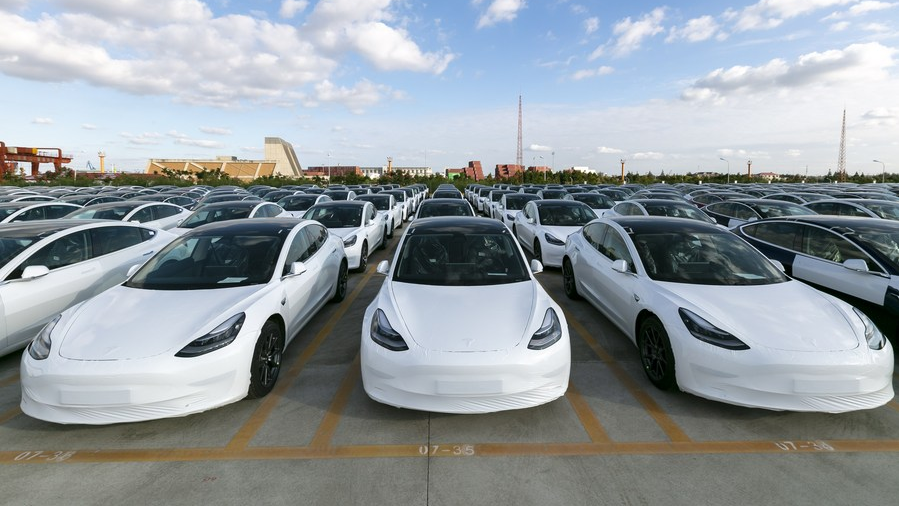 China-made Tesla Model 3 vehicles, which will be exported to Europe, at Waigaoqiao port in Shanghai, east China, October 19, 2020. /Xinhua