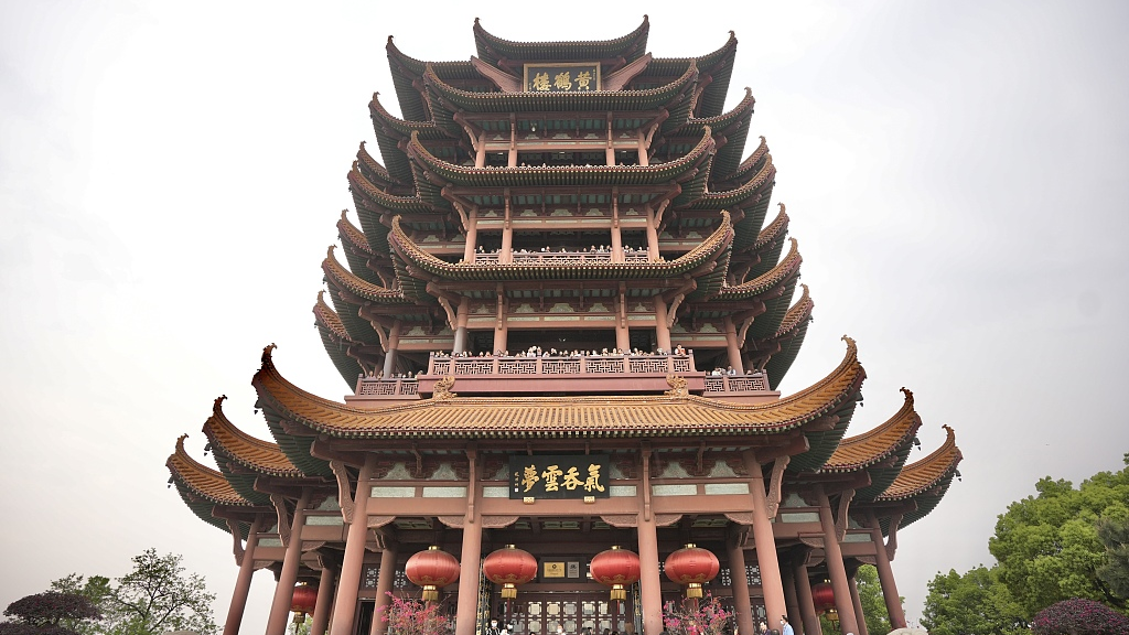 Live: Vibrant Yellow Crane Tower with crowds of tourists during the Labor Day holiday