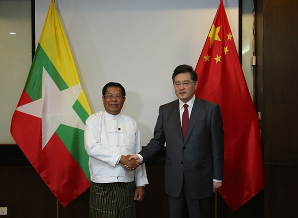 Chinese State Councilor and Foreign Minister Qin Gang (R) shakes hands with Myanmar's Union Minister for Foreign Affairs Than Swe during their meeting in Nay Pyi Taw, Myanmar, May 2, 2023. /Chinese Foreign Ministry