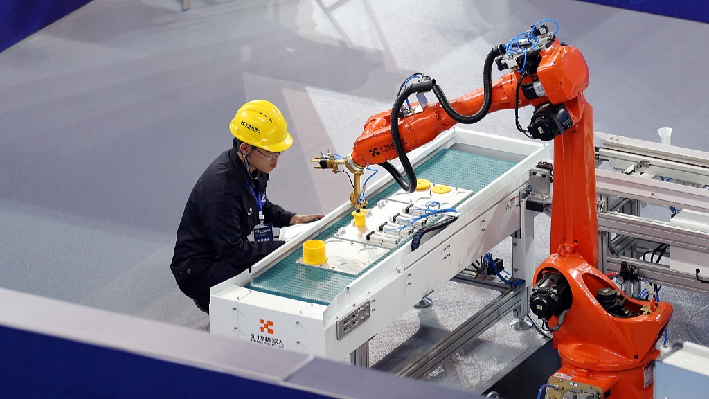 A participant at a contest for industrial robotics application in east China's Zhejiang Province, April 24, 2023. /CFP