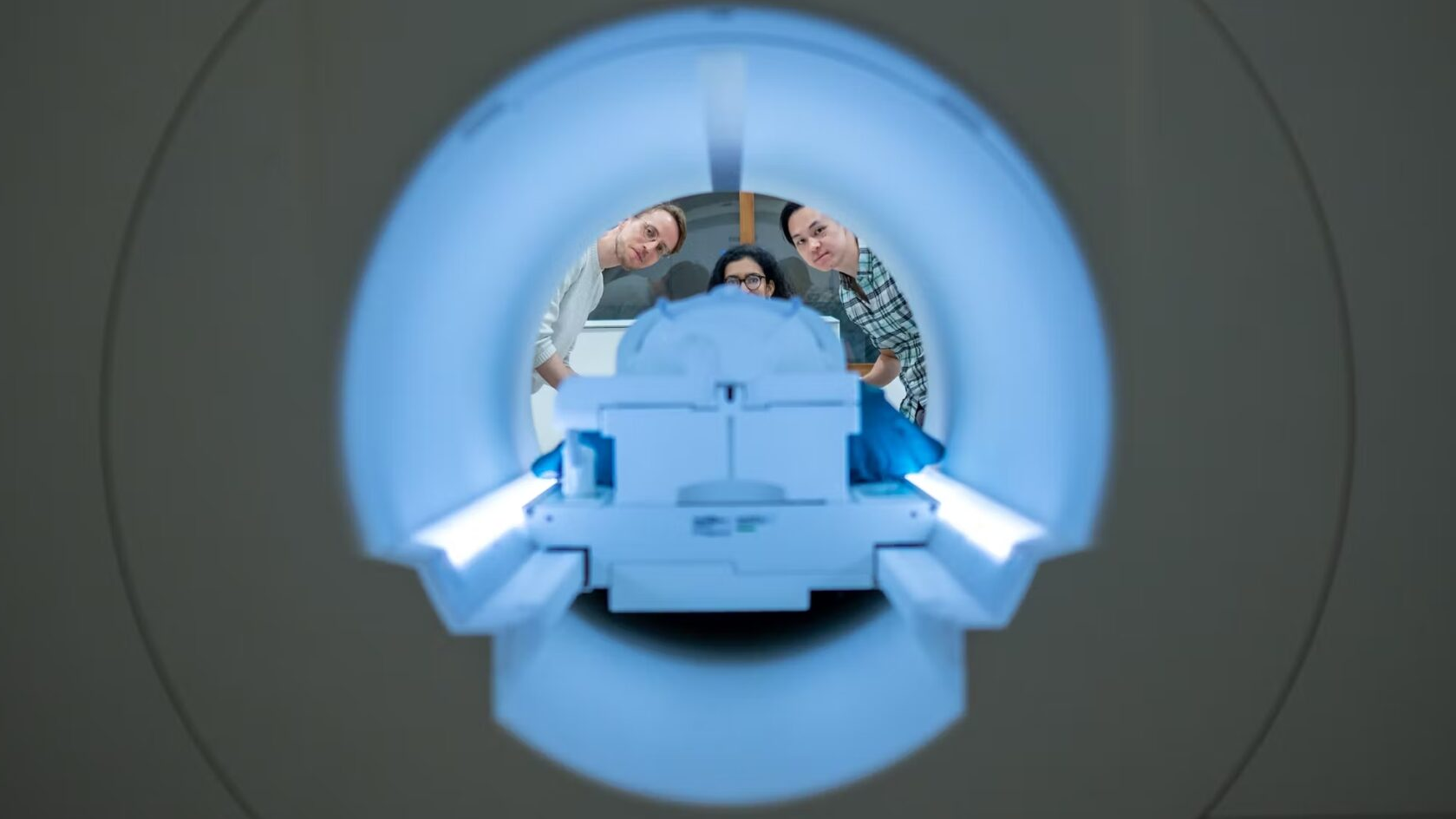 The researchers prepare to collect brain activity data in the Biomedical Imaging Center at UT Austin. /UT Austin
