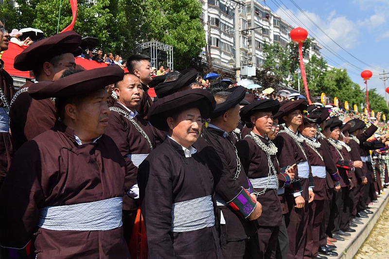 Men from the Miao ethnic group dressed in their traditional costumes participate in the annual Sisters Festival in Guizhou. /CFP