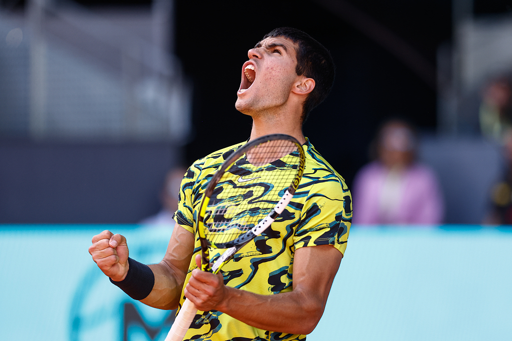 Carlos Alcaraz of Spain celebrates after defeating Karen Khachanov of Russia during the men's singles quarterfinal at the Madrid Open 2023 in Spain, May 3, 2023. /CFP