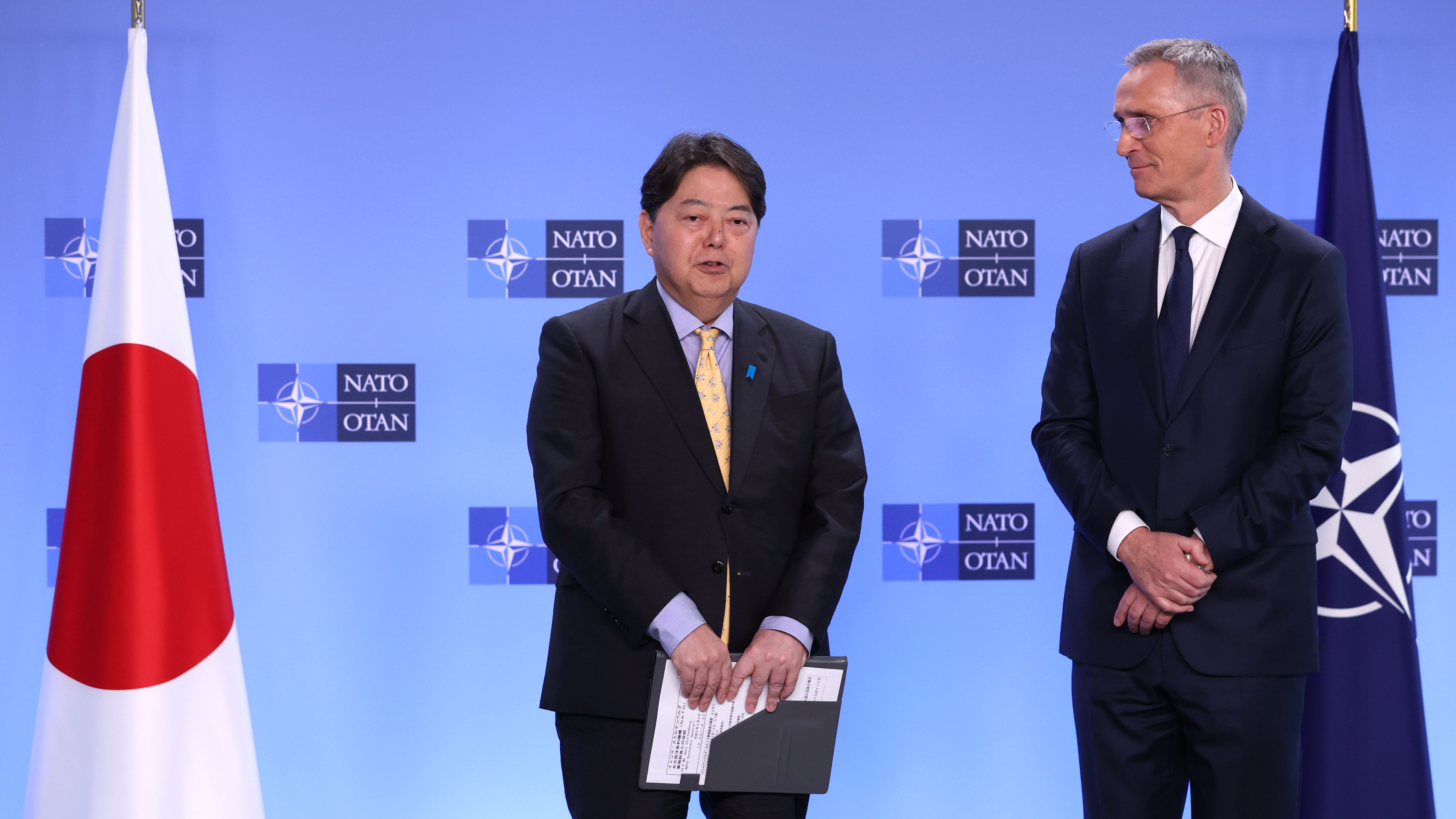 NATO Secretary General Jens Stoltenberg (R) and Japan's Foreign Minister Yoshimasa Hayashi address a media conference on the sidelines of a meeting of NATO foreign ministers at NATO headquarters in Brussels, April 4, 2023. /AP