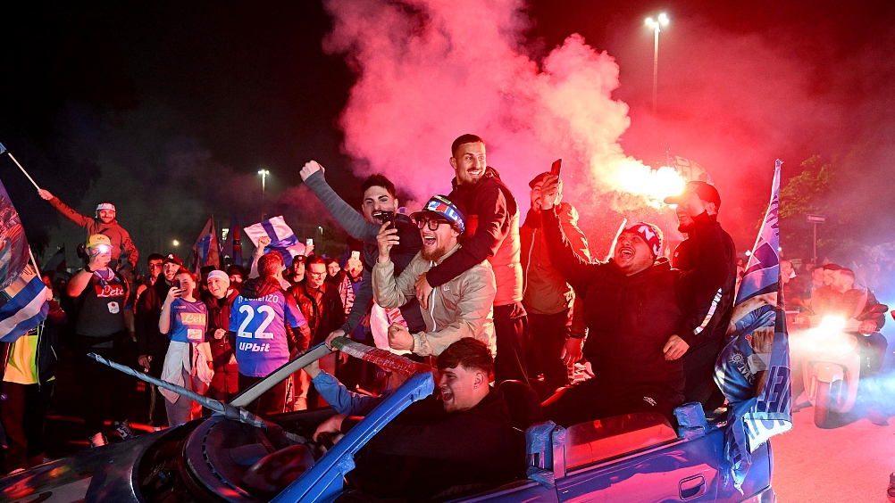 Fans of Napoli celebrate with flares outside the stadium after their side winning the Serie A title at Stadio Diego Armando Maradona in Naples, Italy, May 4, 2023. /CFP