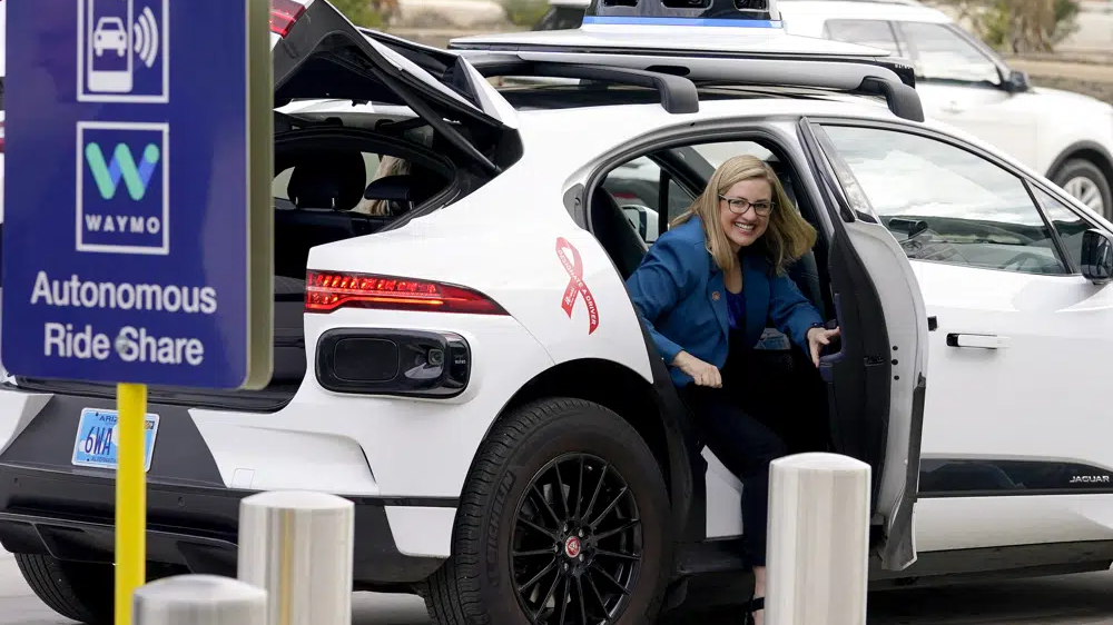 Phoenix Mayor Kate Gallego arrives in a Waymo self-driving vehicle at the Sky Harbor International Airport Sky Train facility in Phoenix, San Francisco, California, Dec. 16, 2022. /AP