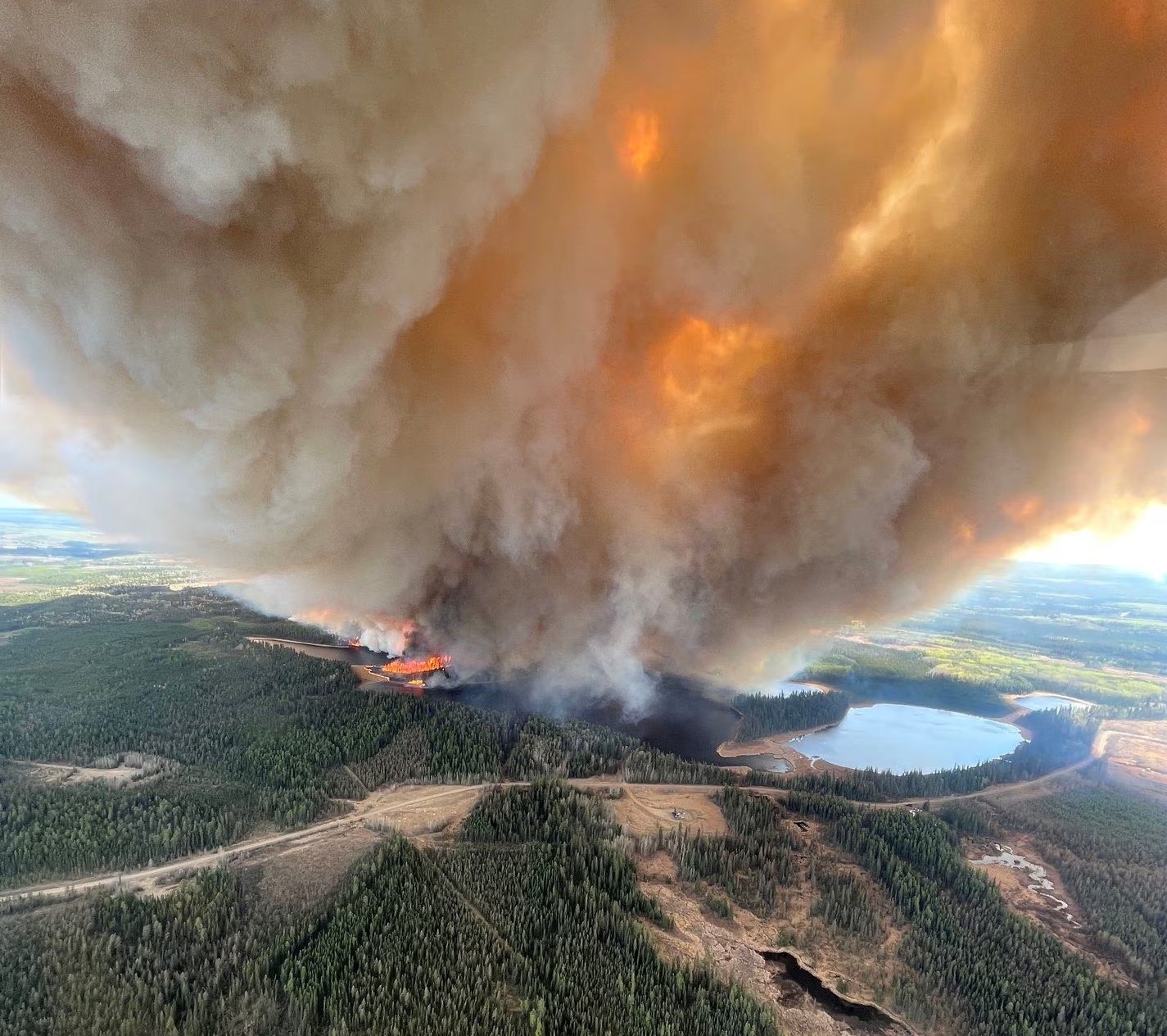 A smoke column rises from wildfire EWF031 near Lodgepole, Alberta, Canada May 4, 2023. Alberta Wildfire/REUTERS