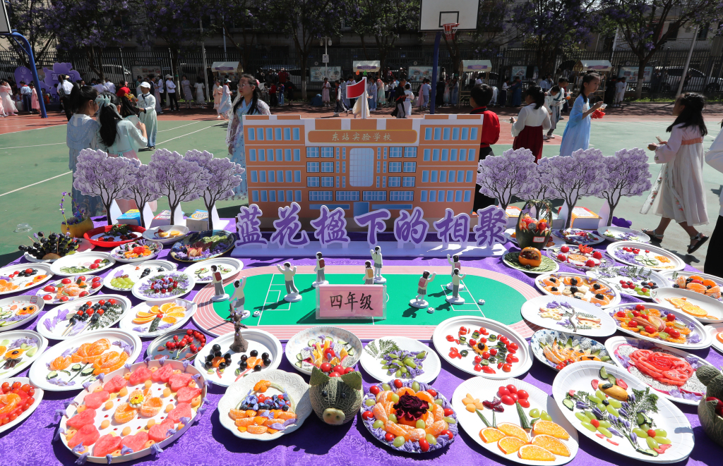 A photo taken on May 6, 2023 shows colorful fruit platters made by students from a school in Kunming, Yunnan Province as part of the school's annual art festival. /CFP