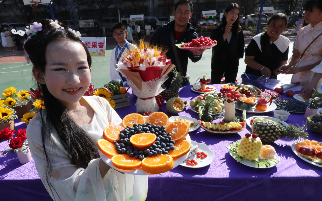 A photo taken on May 6, 2023 shows colorful fruit platters made by students from a school in Kunming, Yunnan Province as part of the school's annual art festival. /CFP