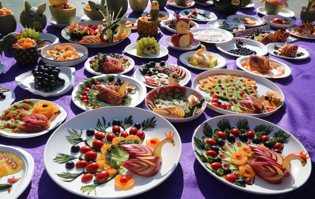 A photo taken on May 6, 2023 shows colorful fruit platters made by students from a school in Kunming, Yunnan Province as part of the school's annual art festival. /CFP